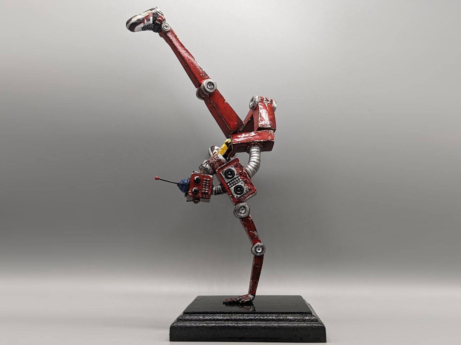 retrobot-groove-dancing-robot-statue-sculpture